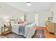 Inviting bedroom with a plush bed, bedside tables, and a decorative rug on hardwood floors at 508 Bolin Creek Dr, Carrboro, NC 27510