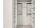 This closet features built-in white shelving and black and white patterned floor at 508 Bolin Creek Dr, Carrboro, NC 27510