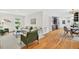 Open-concept living room with hardwood floors seamlessly connecting to the kitchen at 508 Bolin Creek Dr, Carrboro, NC 27510