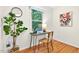 Office space featuring a desk, chair, decor, and a large picture window bringing the outdoors in at 508 Bolin Creek Dr, Carrboro, NC 27510