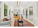 This sunroom provides interior access to another living room and exterior access to a deck at 508 Bolin Creek Dr, Carrboro, NC 27510