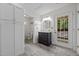 Stylish bathroom featuring a modern vanity, wood look tile flooring, and bright lighting at 5257 Vann St, Raleigh, NC 27606