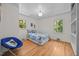 Bedroom with hardwood floors, natural light and comfortable decor at 5257 Vann St, Raleigh, NC 27606
