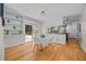 Dining area with a table and chairs, flowing into the kitchen area at 5257 Vann St, Raleigh, NC 27606