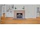 Close-up of living room fireplace, with detailed brick work and built-in shelves at 5257 Vann St, Raleigh, NC 27606