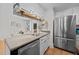 Well-appointed kitchen featuring stainless steel appliances and ample counter space at 5257 Vann St, Raleigh, NC 27606