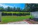 Lush backyard featuring a well-maintained lawn, mature landscaping and patio space for outdoor enjoyment at 536 Rockcastle Dr, Cary, NC 27519