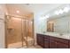 Bathroom featuring double vanity, a glass-enclosed shower, and tile flooring at 536 Rockcastle Dr, Cary, NC 27519