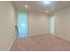 Spacious room featuring neutral carpet, recessed lighting, and a window with natural light at 536 Rockcastle Dr, Cary, NC 27519