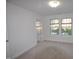 Spacious carpeted bedroom with a window and a view of the neighborhood at 536 Rockcastle Dr, Cary, NC 27519