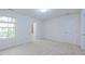 Bright bedroom with carpet, neutral walls, and ensuite bathroom access at 536 Rockcastle Dr, Cary, NC 27519