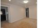 Carpeted bedroom featuring neutral walls and ample closet space, ideal for relaxation and personalization at 536 Rockcastle Dr, Cary, NC 27519