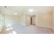 Large bonus room with neutral walls and carpeting is ideal for entertaining at 536 Rockcastle Dr, Cary, NC 27519