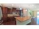 Well-equipped kitchen featuring granite countertops, a center island, modern cabinetry, and stainless steel appliances at 536 Rockcastle Dr, Cary, NC 27519