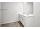 Bathroom featuring a double vanity with granite countertop and chrome fixtures at 5556 Henley Ridge Dr, Graham, NC 27253