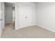 Bedroom featuring a closet and plush carpeting at 5556 Henley Ridge Dr, Graham, NC 27253