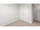 Carpeted bedroom featuring a closet at 5556 Henley Ridge Dr, Graham, NC 27253
