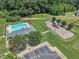 Aerial view showcasing community amenities including a pool, playground, green spaces, and convenient parking at 601 Minerva Dale Dr, Fuquay Varina, NC 27526