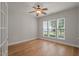 Bright bedroom with hardwood floors and ample natural light at 606 Corrigan Way, Cary, NC 27519