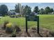 Carolina Preserve Community Park sign with lush green grass and landscaping at 606 Corrigan Way, Cary, NC 27519