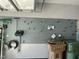 Garage features organizational wall mounted storage solutions and durable flooring at 606 Corrigan Way, Cary, NC 27519