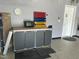 Well-organized garage area with tool storage, cabinets, and workbench for projects at 606 Corrigan Way, Cary, NC 27519