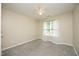 Bedroom with carpet, ceiling fan, and natural light at 617 Woodson Dr, Clayton, NC 27527