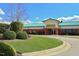 Well-manicured grounds frame the attractive Riverwood Athletic Club clubhouse at 617 Woodson Dr, Clayton, NC 27527