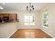 Dining room with hardwood floors, natural light, and access to the kitchen for easy serving at 617 Woodson Dr, Clayton, NC 27527