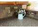 Close up on stylish backsplash and countertops, accented by modern decor at 617 Woodson Dr, Clayton, NC 27527