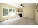 Bright living room with fireplace and plush carpet at 617 Woodson Dr, Clayton, NC 27527