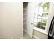Pantry with wire shelving providing efficient storage, adjacent to a window at 617 Woodson Dr, Clayton, NC 27527