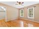 Bedroom with hardwood floors and natural light at 6201 King Croydon Ct Ct, Raleigh, NC 27603