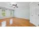 Bedroom featuring hardwood floors, natural light, and a ceiling fan at 6201 King Croydon Ct Ct, Raleigh, NC 27603