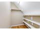 Walk-in closet with shelving and hardwood floors at 6201 King Croydon Ct Ct, Raleigh, NC 27603