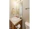 Bathroom featuring vanity with mirror, sink, and neutral wall paint at 635 Raymond Dr, Wendell, NC 27591