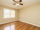 A cozy bedroom with a ceiling fan, a window letting in plenty of natural light at 635 Raymond Dr, Wendell, NC 27591