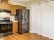 Classic kitchen showcasing stainless steel appliances and closet, perfect for culinary enthusiasts at 635 Raymond Dr, Wendell, NC 27591