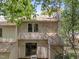 Back exterior view showcasing a two-story home with a sliding glass door to access the backyard at 6422 English Oaks Dr, Raleigh, NC 27615