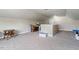 Bright bonus room with carpeted floor, large window, and neutral colors at 6901 Rex Rd, Holly Springs, NC 27540