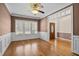 Inviting dining room featuring hardwood floors, crown molding, and an open view to the foyer at 6965 Ogburn Farms Dr, Willow Springs, NC 27592