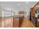 Spacious kitchen featuring a breakfast bar, stainless steel appliances, and an open layout at 6965 Ogburn Farms Dr, Willow Springs, NC 27592