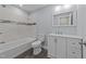 The bathroom has a marble tiled backsplash and updated fixtures at 703 Whitsett Ave, Gibsonville, NC 27249