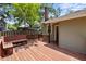 Wood deck and bench offers space to enjoy the peaceful backyard setting at 708 Parker St, Durham, NC 27701