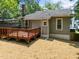 View of the backyard, back deck and freshly mulched yard at 708 Parker St, Durham, NC 27701