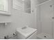 Bright bathroom features a white vanity, mirror, and shower with great natural light at 708 Parker St, Durham, NC 27701