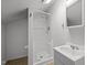 Cozy bathroom features a shower and vanity with natural light at 708 Parker St, Durham, NC 27701