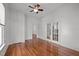 Bright bedroom with hardwood floors and a neutral color palette at 708 Parker St, Durham, NC 27701