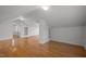 Bonus room with hardwood floors and built-in shelves at 708 Parker St, Durham, NC 27701