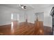 Open-concept living room with hardwood floors and spacious layout at 708 Parker St, Durham, NC 27701